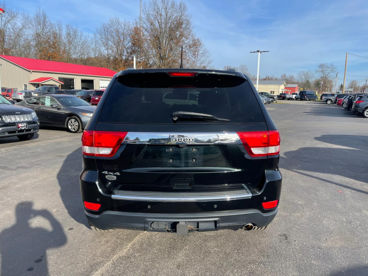 2013 Black /Gray Jeep Grand Cherokee (1C4RJFCG5DC) , located at 547 E. Main St., Orwell, OH, 44076, (440) 437-5893, 41.535435, -80.847855 - Photo#9